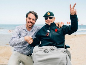Juno Beach, Normandy -- Documentary filmmaker Eric Brunt, who spent almost a year criss-crossing the country to speak with 400 Canadian veterans of the Second World War, joins Frank Krepps at Juno Beach on the anniversary of D-Day this June, almost a year after the filmmaker had interviewed the veteran at Krepp's Red Deer, Alta., home. (Submitted photo)