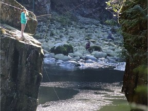 Two people were rushed to hospital, one in critical condition, following a rescue along the Capilano River in North Vancouver on Sunday afternoon.