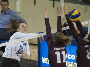 UBC Thunderbirds outside hitter Anna Price hits a kill past the MacEwan University Griffins during U Sports Canada West volleyball action at the University of B.C. in 2017.