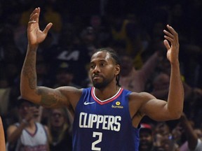 LA Clippers forward Kawhi Leonard reacts in the second half at Staples Center.