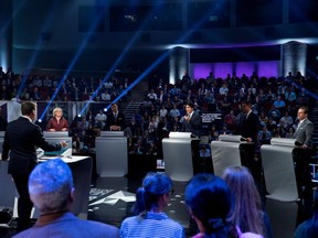 Federal party leaders, left to right, NDP leader Jagmeet Singh, Green Party leader Elizabeth May, People's Party of Canada leader Maxime Bernier, Liberal leader Justin Trudeau, Conservative leader Andrew Scheer, and Bloc Quebecois leader Yves-Francois Blanchet take part in the Federal leaders French language debate in Gatineau, Quebec.