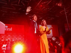 Liberal leader and Canadian Prime Minister Justin Trudeau waves to supporters beside his wife Sophie Gregoire Trudeau after the federal election at the Palais des Congres in Montreal, Quebec, Canada October 22, 2019.