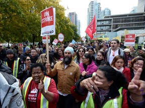 New Democratic Party (NDP) leader Jagmeet Singh marches with striking workers outside of the Westin Bayshore during an election campaign visit in Vancouver, British Columbia, Canada October 14, 2019.