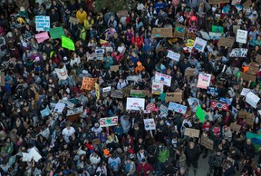 File photo: Thousands of people gather outside Vancouver City Hall before marching downtown during a climate strike in Vancouver in 2019. THE CANADIAN PRESS/Darryl Dyck