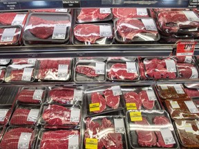 Cuts of beef are seen at a supermarket in Montreal on June 26, 2019. A Canadian scientist who co-led a study that challenges well-worn advice to limit meat consumption is responding to criticisms he should have disclosed past ties to the global meat and food industry.