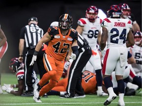 B.C. Lions' Kevin Haynes celebrates after B.C. stopped the Montreal Alouettes on the goal-line during a CFL game at B.C. Place Stadium on Sept. 28. The Lions' defence has helped the team string some wins together in the past month.