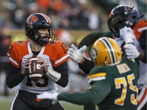 B.C. Lions quarterback Mike Reilly (13) looks to make the pass during first half CFL action against the Edmonton Eskimos, in Edmonton on Saturday, Oct. 12, 2019.