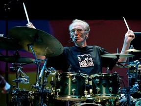 Drummer Ginger Baker of the legendary supergroup Cream performs during a concert at the Royal Albert Hall in London, Britain May 2, 2005. (REUTERS/Dylan Martinez/File Photo)