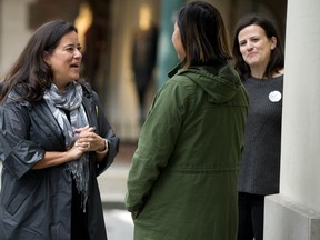 Jody Wilson-Raybould (left), independent candidate for Vancouver Granville, talks with Ivy Haisell (centre) while campaigning on Granville Street on Oct. 3, as campaign manager Melissa Doyle looks on.
Photo by Mike Bell.