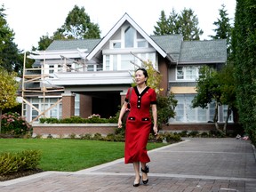 Meng Wanzhou, chief financial officer of Huawei Technologies Co., leaves her home for a court appearance in Vancouver, British Columbia, Canada, on Tuesday, Oct. 1, 2019.