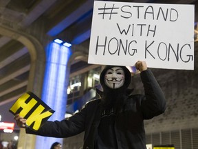 One of the supports of democracy in Hong Kong that demonstrated outside the NBA pre-season game in Vancouver on Thursday, Oct. 17, 2019.