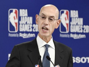 NBA Commissioner Adam Silver speaks during a news conference before the NBA preseason basketball game between Houston Rockets and Toronto Raptors at Saitama Super Arena in Saitama, Japan October 8, 2019, in this photo taken by Kyodo.