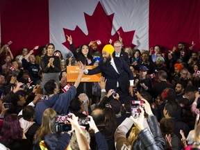 NDP leader Jagmeet Singh reaches out to the crowd at the NDP election night victory party, Burnaby, October 21 2019.