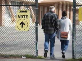 Voters at the advanced polling station at Vancouver Technical Secondary School in Vancouver on Oct. 12, 2019.