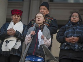 Joan Phillip, Grand Chief Stewart Phillip and Chief Judy Wilson listen as Swedish climate activist Greta Thunberg addresses the crowd at a climate rally in Vancouver on Friday, Oct. 25, 2019.