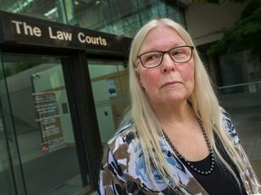 Rosemary Anderson, who claims that Father Erlindo Molon sexually assaulted her over a period of months in 1976 and 1977, outside B.C. Supreme Court in Vancouver.