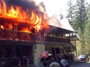 Firefighters prepare to enter a burning apartment in Merville on Tuesday, Oct. 8, 2019. Photograph By CHEK NEWS