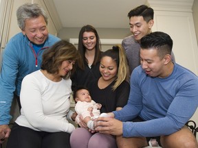 Clockwise from top left: Emmanuel Domingo, Bailey Dagg, Lukas Domingo, Josh Domingo, Kathleen Domingo — holding baby Emma — and Teresa Domingo will be running in next spring’s Sun Run. Despite being fitted for sneakers, Emma won’t be on the starting line come April 19.