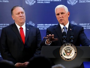 U.S. Vice President Mike Pence speaks during a news conference, as U.S. Secretary of State Mike Pompeo looks on, at the U.S. Embassy in Ankara, Turkey, October 17, 2019.