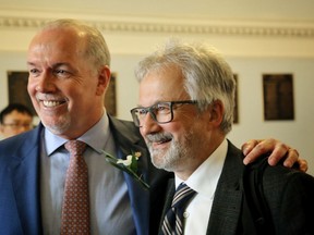 B.C. Premier John Horgan, left, with Geoff Meggs at the legislature.