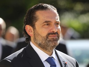 Lebanese Prime Minister Saad Hariri speaks to the press at the Elysee Palace in Paris on September 20, 2019.