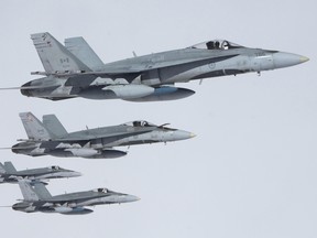 Canadian Fighter-18 (CF-18) Hornet Jets during an Air to Air refuelling exercise with a Canadian Forces Airbus during exercise Maple Flag 42.