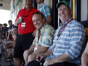 A photo shortly after the B.C. election shows Green Leader Andrew Weaver and NDP Leader John Horgan take in the final match between Team Canada and New Zealand during cup final action at the HSBC Canada Women's Sevens at Westhills Stadium in Langford, B.C. It was one of several meeting to work through a bitter election campaign and join to topple the Liberals.