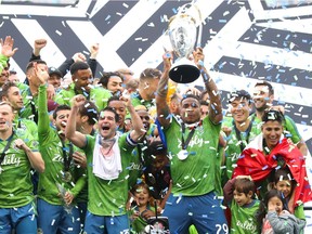 SEATTLE, WASHINGTON - NOVEMBER 10: The Seattle Sounders celebrate after defeating Toronto FC 3-1 to win the 2019 MLS Cup at CenturyLink Field on November 10, 2019 in Seattle, Washington.