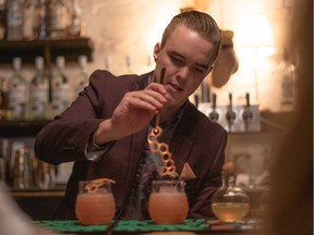 Max Curzon-Price, bartender at Botanist at the Fairmont Pacific Rim in Vancouver, prepares his award-winning The Plight of the Bumblebee cocktail.