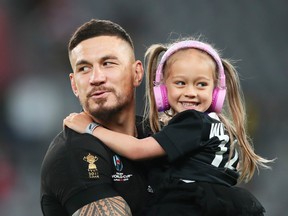 Sonny Bill Williams of New Zealand and his daughter Imaan react as they walk around the pitch following his team's victory in the Rugby World Cup 2019 Bronze Final match between New Zealand and Wales at Tokyo Stadium on November 01, 2019 in Chofu, Tokyo, Japan.