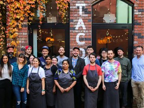 Front and back of house staff from Tacofino, which will be hosting the Shift Change fundraiser and awareness campaign for Mind the Bar on Nov. 25. Among them are: managing partner Gino Di Domenico (second from left); manager of people and engagement Taylor Chobotiuk (centre, in black baseball cap); and restaurant co-founder Jason Sussman (second from right).