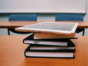 Books and tablet in a classroom