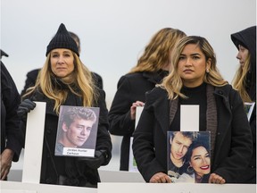 Left to right: Sharene Shuster Jordan Hunter Carhoun's mom and Jasmine Wilson Jordan's girlfriend. Moms Stop the Harm group at Jericho Beach as they stage a photo opportunity of the group of over 50 mothers who lost children to the opioid crisis holding crosses dressed in black