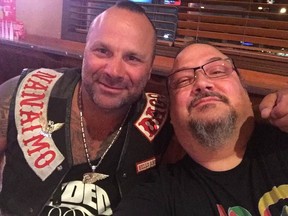 Slain Hells Angel Chad Wilson, left, poses with Zale Coty, a member of the Throttle Lockers motorcycle club, Coty's Kamloops business was raided by police as part of a drug trafficking investigation.