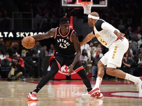 Raptors forward Pascal Siakam (43) handles the ball against Atlanta Hawks guard Vince Carter. Carter is set to retire after this season. Adam Hagy-USA TODAY Sports