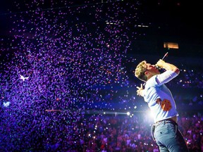 Chris Martin of music group Coldplay performs onstage during the 2017 iHeartRadio Music Festival at T-Mobile Arena on September 22, 2017 in Las Vegas, Nevada.
