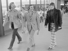 It was the ’70s, after all: Stylish (for the times) Vancouver Canucks forwards John Gould, Andre Boudrias and Gerry O’Flaherty (left to right) in Vancouver International Airport after returning from Montreal, where they were eliminated from the playoffs by the host Canadiens the night before in Game 5 of their quarter-final series.