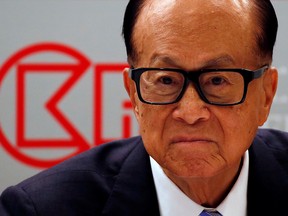 FILE PHOTO: Hong Kong tycoon Li Ka-shing looks on during a news conference announcing the CK Hutchison Holdings company results in Hong Kong, China March 17, 2016.