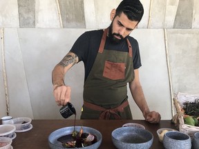 Sous chef Ibrahim Amaya demonstrates his craft at Jazamango’s open-concept outdoor kitchen.