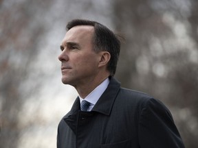 Bill Morneau, who remains Minister of Finance, arrives for a swearing in ceremony at Rideau Hall in Ottawa, on Wednesday, Nov. 20, 2019.