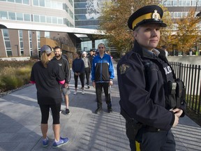 RCMP applicants take part in Run with a Recruiter at E Division Headquarters in Surrey. Pictured is Const. Erika Dirsus, an RCMP recruiter.