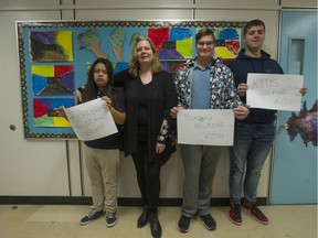 Greater Heights Learning Academy principal Kathleen Jeffrey with students Kaylee Natrell-Baker, Maxamillio Comin and Jules Schoenefuhs.