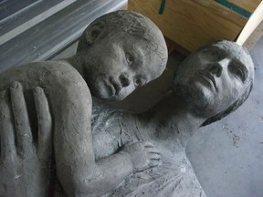 The Jack Harman sculpture The Family lies in a Surrey storage locker earlier this month.