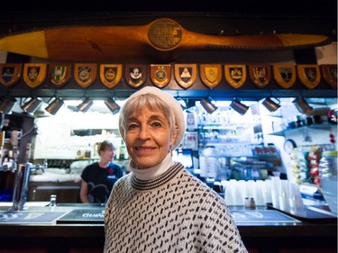 VANCOUVER, BC - November 11, 2019  - Tassillie Dent stands in front of a wooden propeller once owned by her family since WW1, which is mounted inside the Billy Bishop (Legion) pub during Remembrance Day ceremony in Vancouver, BC, November 11, 2019.  (Arlen Redekop / PNG staff photo) (story by Sue Lazaruk) [PNG Merlin Archive]