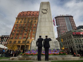 Salutes at the memorial cenotaph during Remembrance Day ceremonies at Victory Square in Vancouver on Nov. 11.