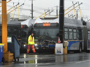 Buses and workers at the transit depot on Hudson Avenue in Vancouver during escalating job action by Coast Mountain Bus Company employees.