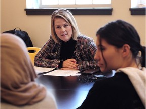 Coun. Rebecca Bligh talks to a group of high school students at Vancouver Technical Secondary as part of the launch of the city's ambitious Vancouver Plan.