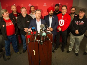 Gavin McGarrigle, western regional director of Unifor, leads a rally at Unifor office in New Westminster, BC, November 20, 2019.