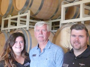 Black Widow Winery co-founder Dick Lancaster (centre) is joined in the boutique business by his daughter Shannon and son James.