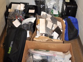 Some of the stolen and illegal item seized during a search of Cody Parent's Surrey home. Parent, 26, has been sentenced to three years in prison for a spree of burglaries in North Vancouver.